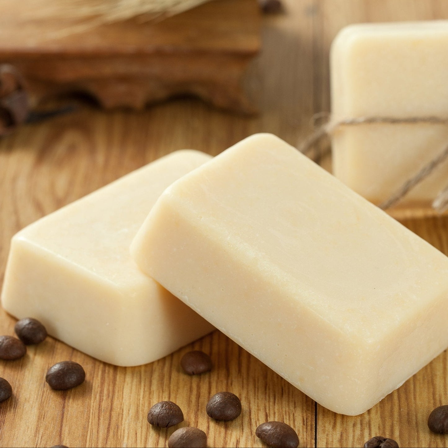 The Ultimate "Soul & Skin" Sanctuary Kit featuring handmade fresh goat's milk soap on a wooden surface.
