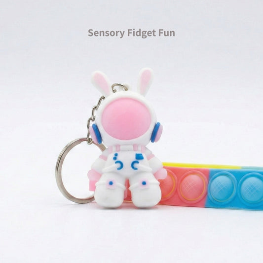 Play-Safe Sensory Charm Set: Astronaut & Pop-it Strap